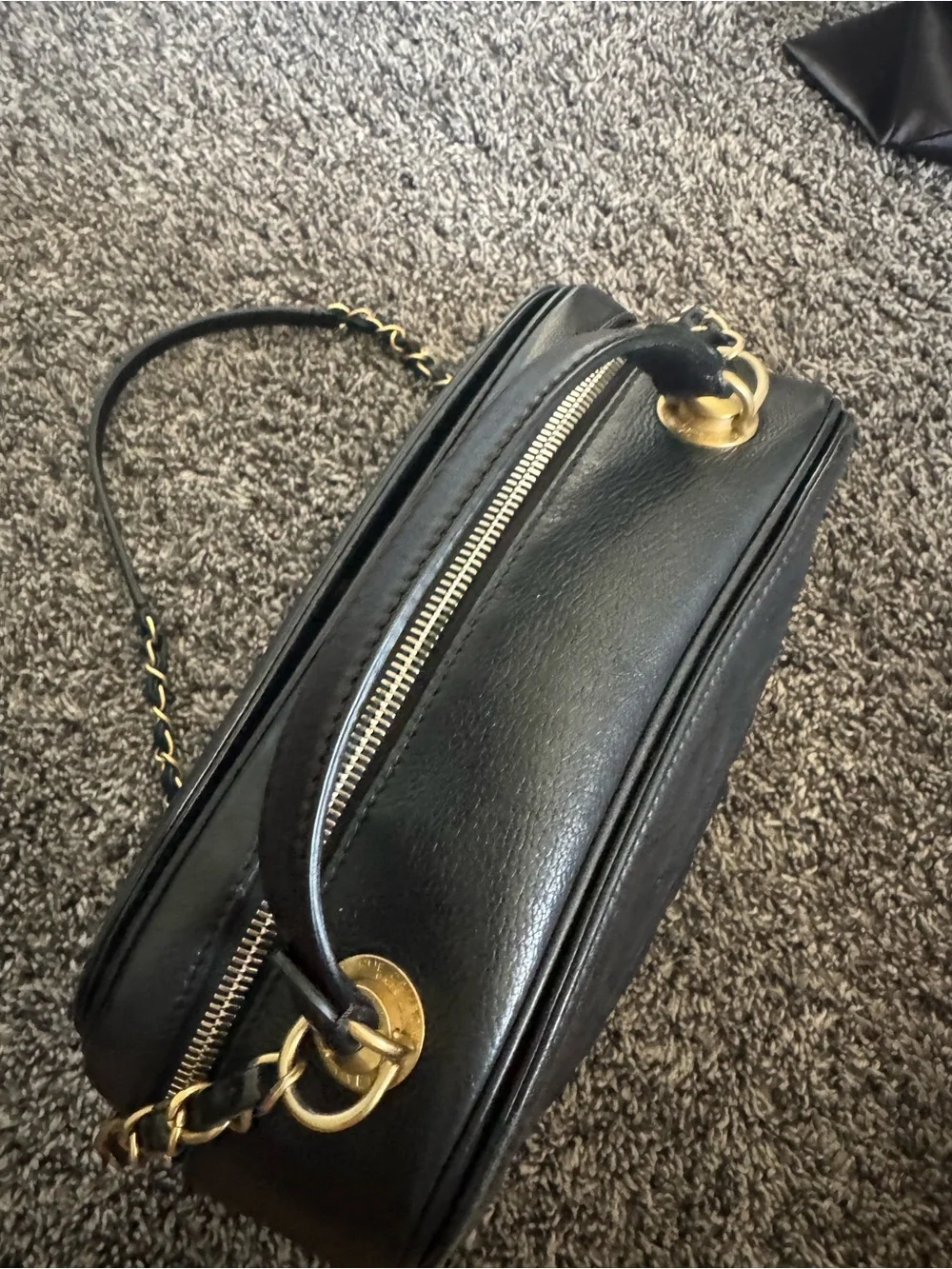 CHANEL Calfskin Quilted CC Vanity Case in black with gold hardware